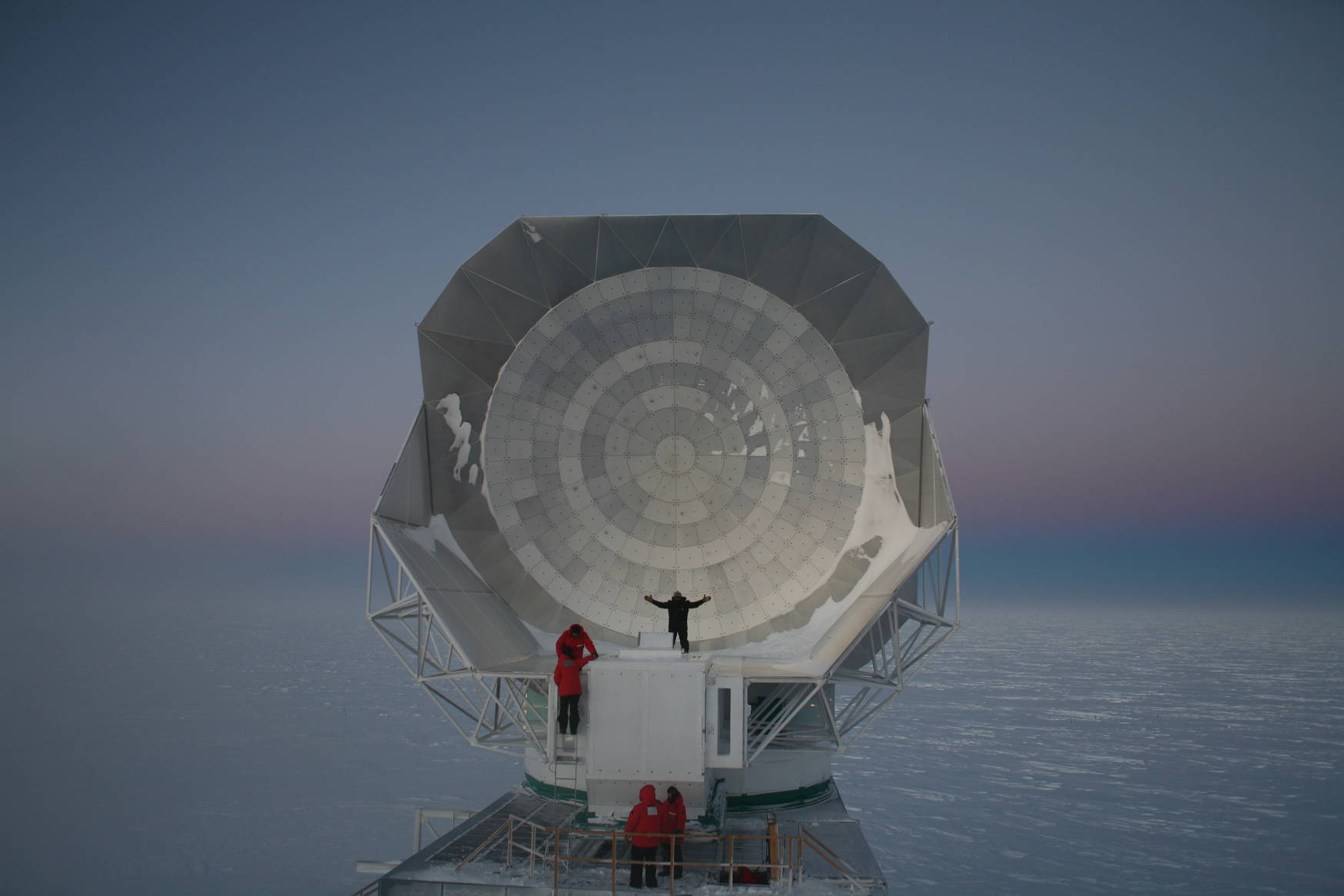 Visitors from station realizing just how large the south pole telescope really is.