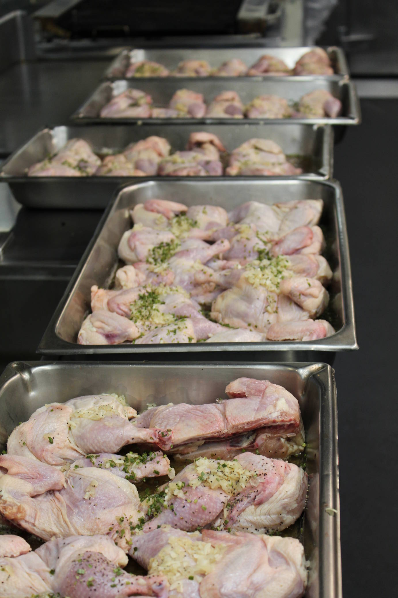 Behind the scenes - preparing the chicken halves (Photo: Stephanie Olcott)